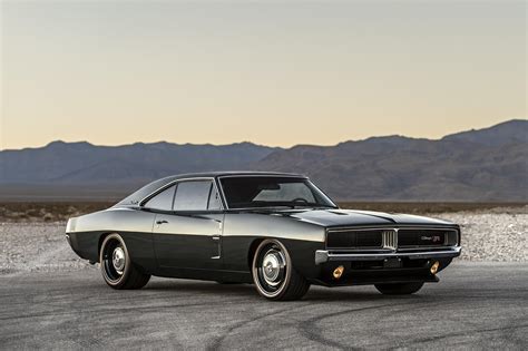 The RT option for the Dodge Charger stands for Road & track. And the 1969 Charger R/T started at $3,575, which included the 440 Magnum engine, rated for 375 hp, along with a three-speed Torque Flite automatic transmission linked to an open differential containing a 3.23:1 gear set. The unit-body chassis was also fitted with a heavy-duty version ...
